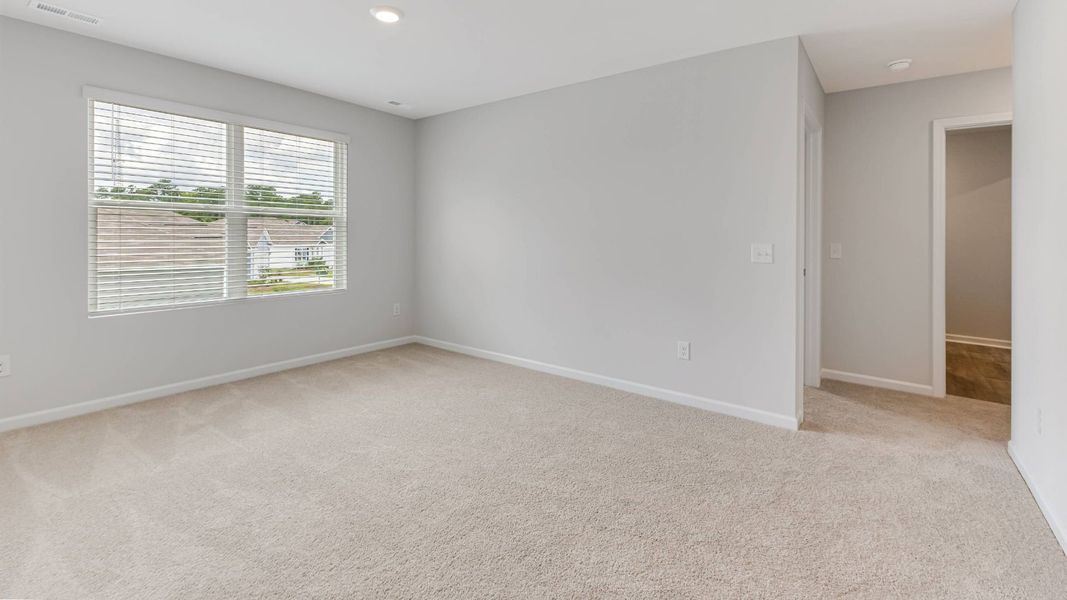 Representative unfurnished interior of a home built from the HAYDEN by D.R. Horton in Saltgrass Landing, Winnabow (Image 24).