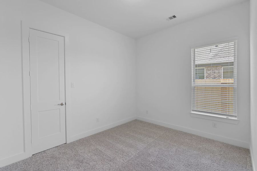 Representative unfurnished interior of a home built from the Mickelson by Chesmar Homes in Riceland Alley Loads, Mont Belvieu (Image 87).