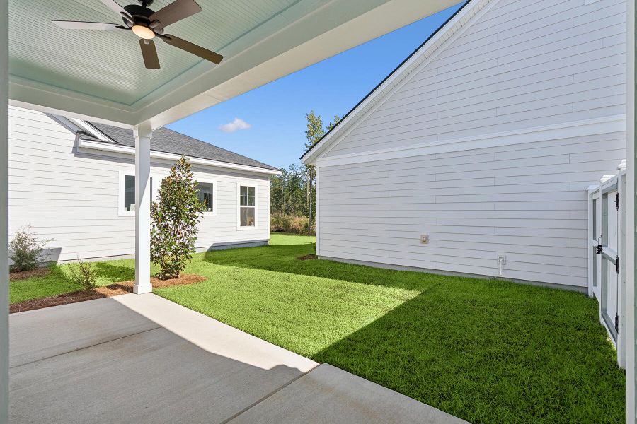 Exterior details and patio area of a home in Nexton – Midtown – The Garden Collection, Summerville (Image 23).