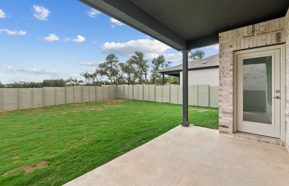 Exterior details and patio area of a home in Wolf Ranch, Georgetown (Image 22). Exterior details and patio area of a home in Wolf Ranch, Georgetown (Image 22).
