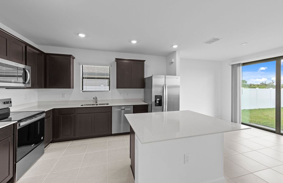 Furnished interior view inside a new home in Caloosa Cove, Labelle (Image 5).