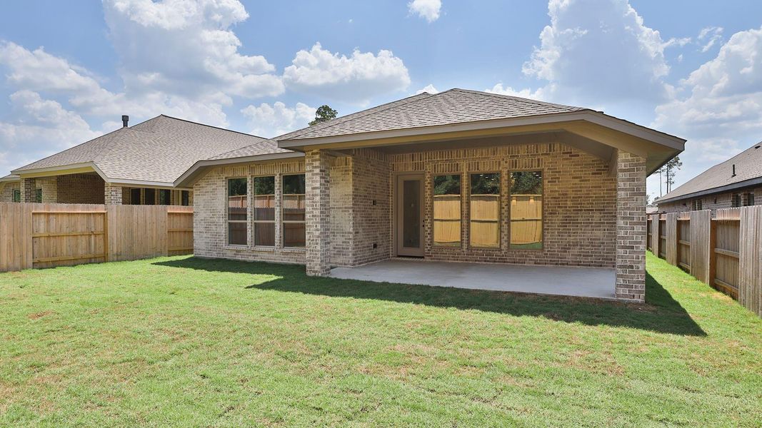 Exterior details and patio area of a home in Evergreen, Conroe (Image 3).