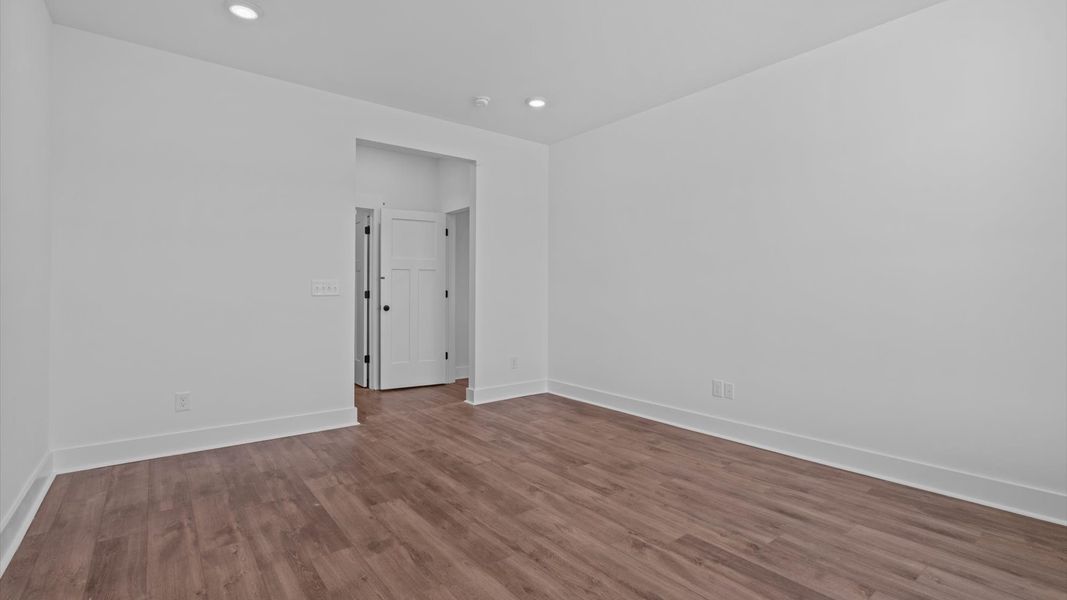 Primary suite that offers first-rate relaxation with established style and elevated finishes