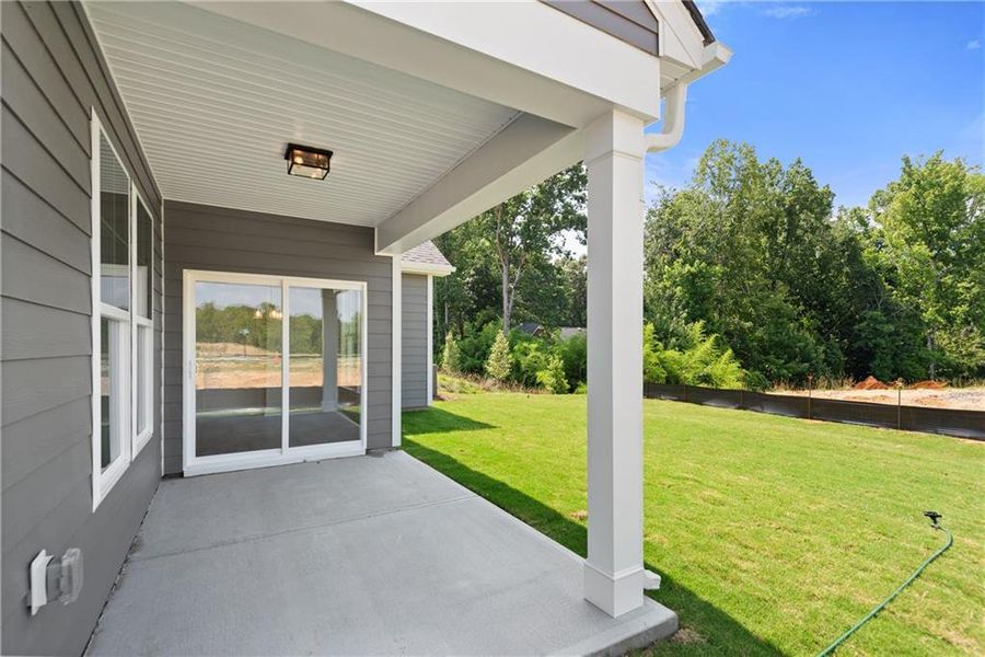 Exterior details and patio area of a home in , Loganville (Image 24).