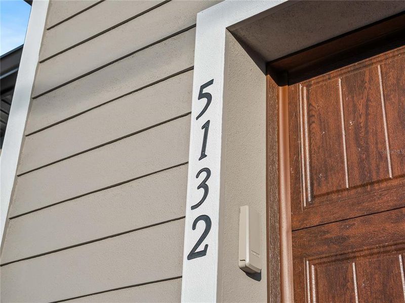 Exterior details and patio area of a home in , North Port (Image 31).