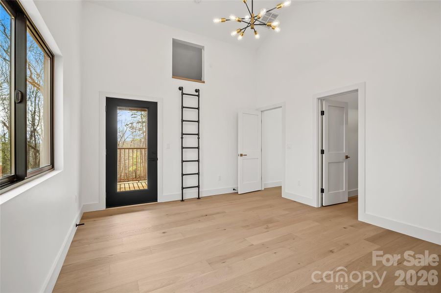 Hidden ladder-accessed bonus space ideal for reading nook, play area, or storage