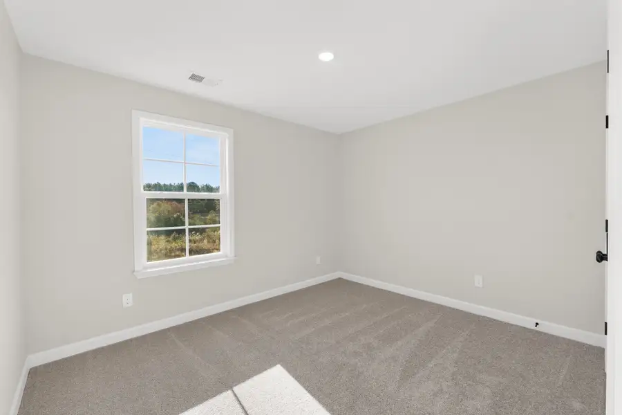 Spacious, unfurnished interior of a new home in Foxhall Landing, Easley (Image 29).