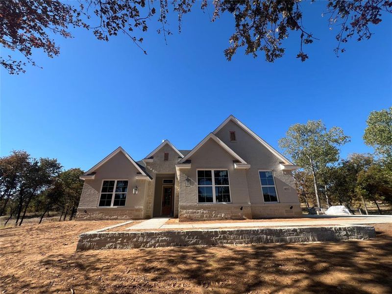 In-progress construction of a new home in Escondido Ranches, Poolville, TX (Image 19).