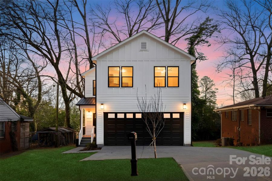 Front exterior of a new home in , Charlotte, NC, highlighting curb appeal (Image 25).