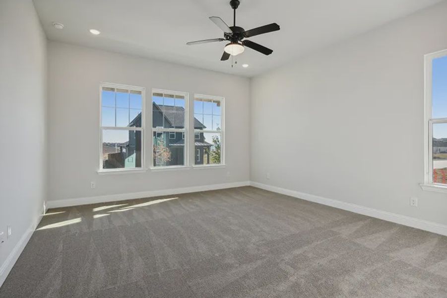 Representative unfurnished interior of a home built from the Peyton by Cambridge Homes in Lake Park, Rowlett (Image 23).