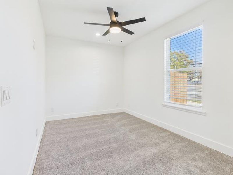 Unfurnished room featuring light colored carpet, recessed lighting, and a ceiling fan Unfurnished room featuring light colored carpet, recessed lighting, and a ceiling fan