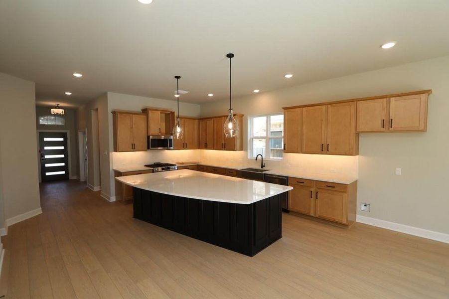 Furnished interior view inside a new home in Meridiana 55' Homesites, Manvel (Image 11).