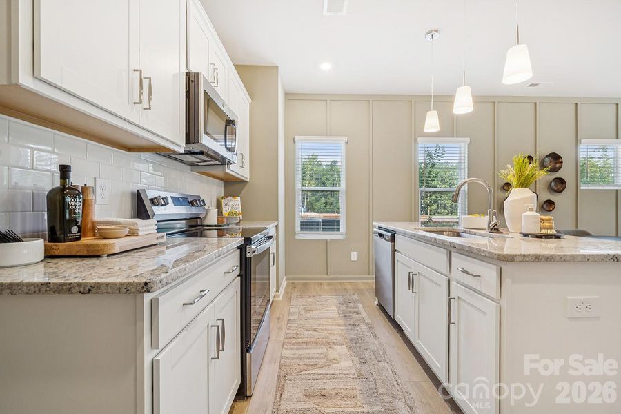 Example rendering Only - Home under construction with estimated completion in April or May.