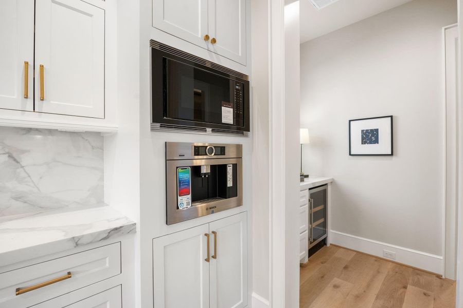 Built-in Bosch Coffee maker & microwave w/ butler pantry.