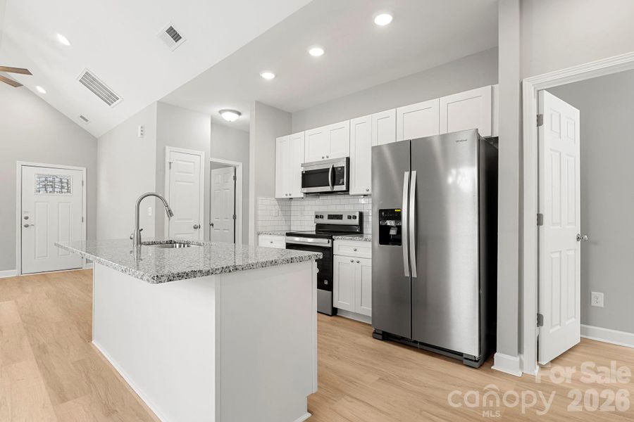 Furnished interior view inside a new home in , Statesville (Image 11).