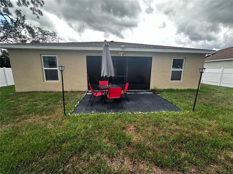 Front exterior of a new home in , Kissimmee, FL, highlighting curb appeal (Image 19). Front exterior of a new home in , Kissimmee, FL, highlighting curb appeal (Image 19).