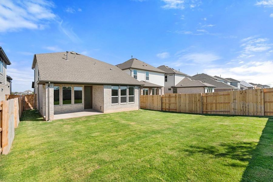 Exterior details and patio area of a home in Flora, Hutto (Image 25).