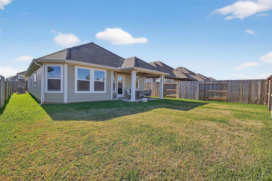 Exterior details and patio area of a home in Moran Ranch, Willis (Image 21).