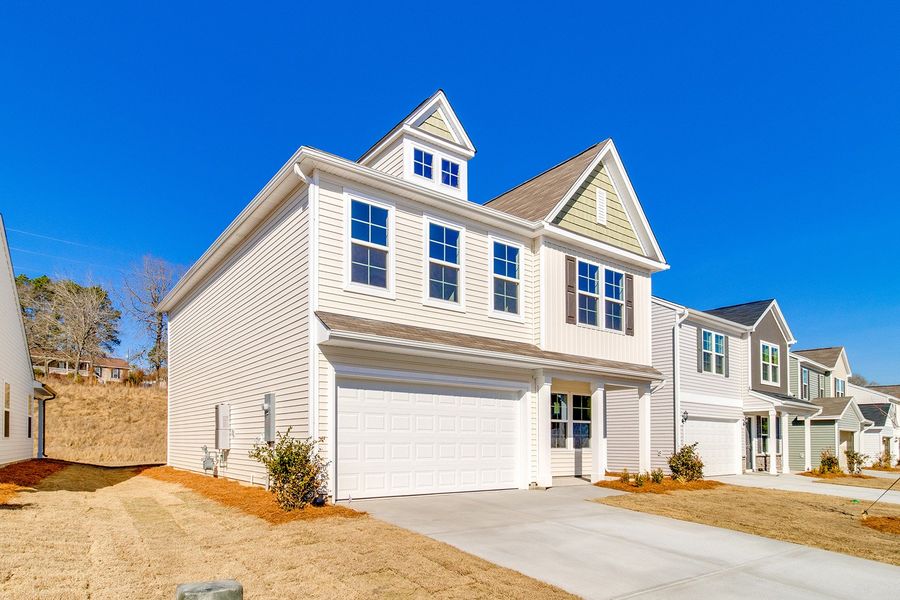 Front exterior of a new home in Bluefield, Lexington, SC, highlighting curb appeal (Image 2). Front exterior of a new home in Bluefield, Lexington, SC, highlighting curb appeal (Image 2).