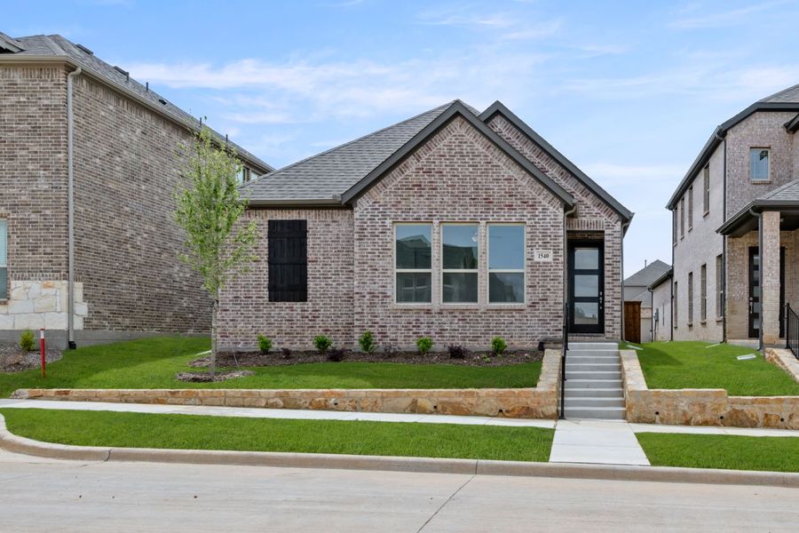 Representative exterior photo of a completed home built from the Durango by Windsor Homes in Walton Ridge, Corinth, TX (Image 2). Representative exterior photo of a completed home built from the Durango by Windsor Homes in Walton Ridge, Corinth, TX (Image 2).