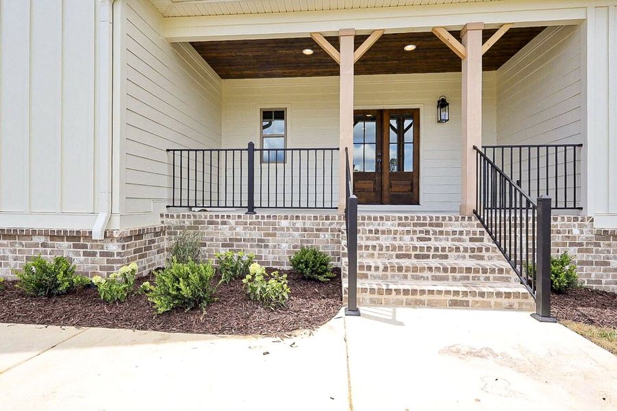 Exterior details and patio area of a home in Baker Road, Birchwood (Image 3).
