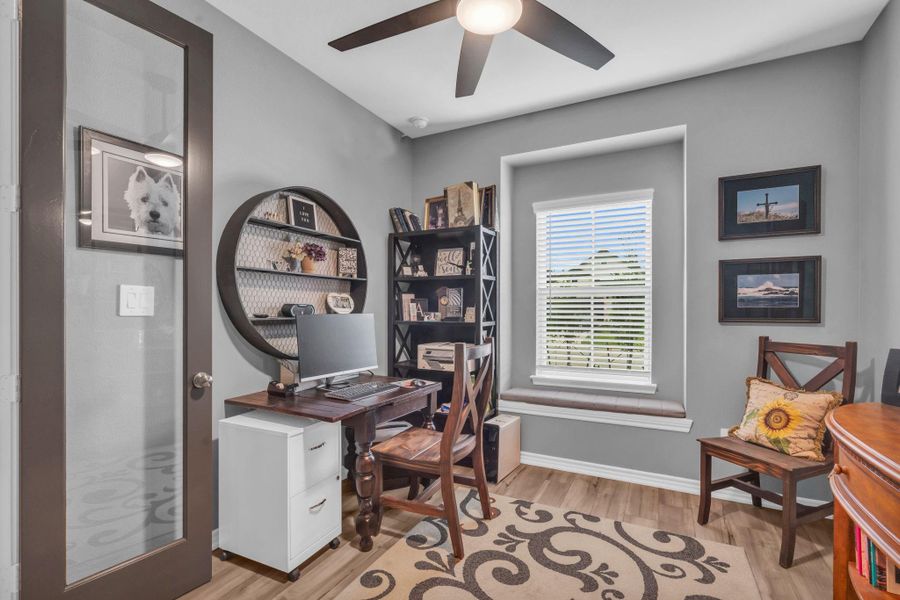 This room makes the perfect home office/study. Upgraded ceiling fan and window seat. This home has designer paint on the interior rooms and doors. This room makes the perfect home office/study. Upgraded ceiling fan and window seat. This home has designer paint on the interior rooms and doors.