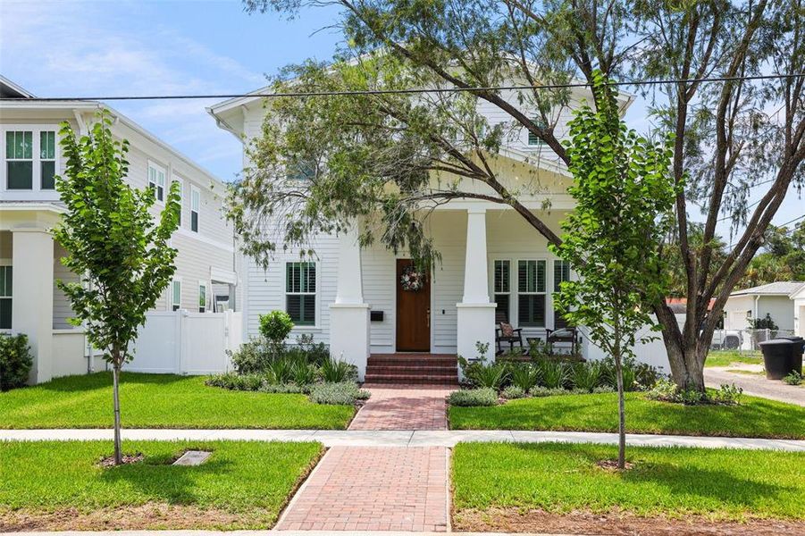 Front exterior of a new home in , St. Petersburg, FL, highlighting curb appeal (Image 1). Front exterior of a new home in , St. Petersburg, FL, highlighting curb appeal (Image 1).