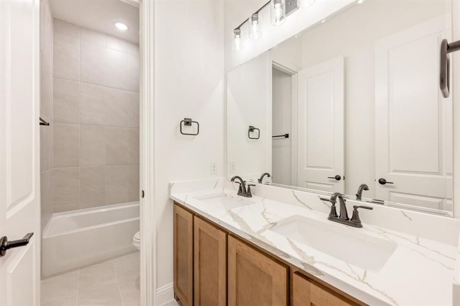 Furnished interior view inside a new home in Windsong Ranch Classic 61, Prosper (Image 9).