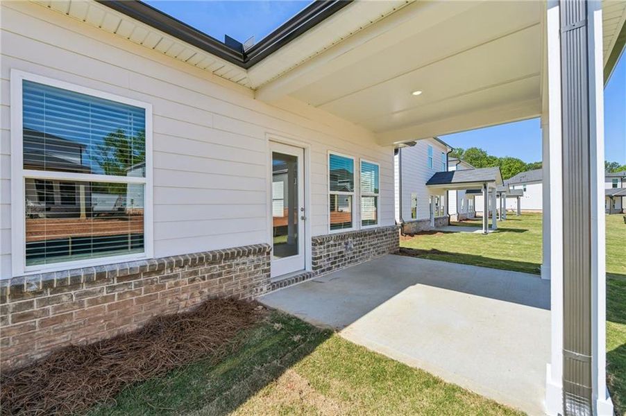 Exterior details and patio area of a home in Martin Springs - Reserve Series, Lawrenceville (Image 4).