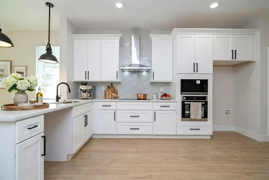 Furnished interior view inside a new home in , Apopka (Image 4).