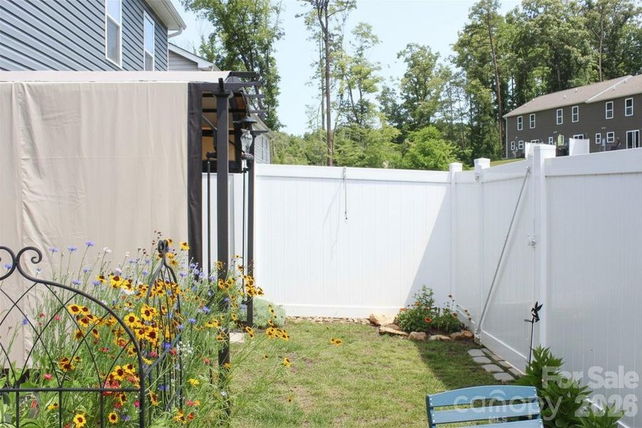 Exterior details and patio area of a home in , Candler (Image 21). Exterior details and patio area of a home in , Candler (Image 21).