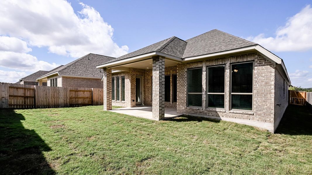 Exterior details and patio area of a home in Crosswinds, Kyle (Image 24).