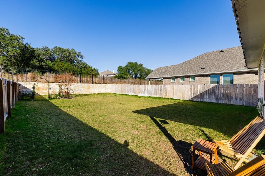 View of fenced backyard