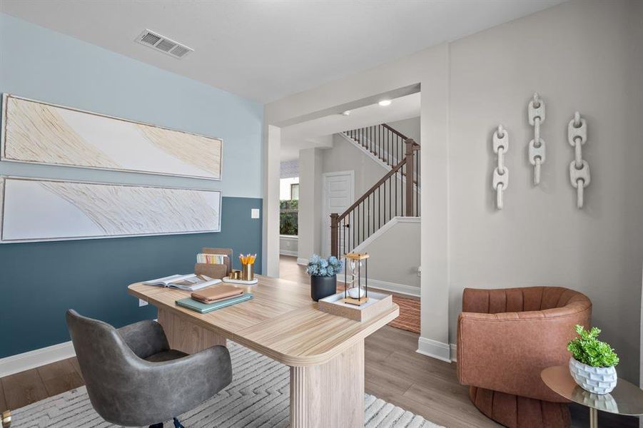 Office featuring baseboards and light wood-style flooring