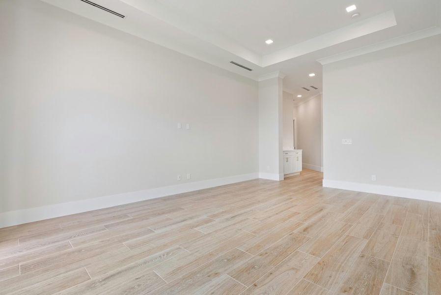 Representative unfurnished interior of a home built from the Madrona 58 by GHO Homes in Tesoro Club, Port St. Lucie (Image 42).