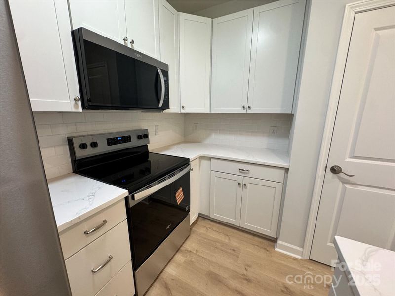 Furnished interior view inside a new home in , Lowell (Image 9).