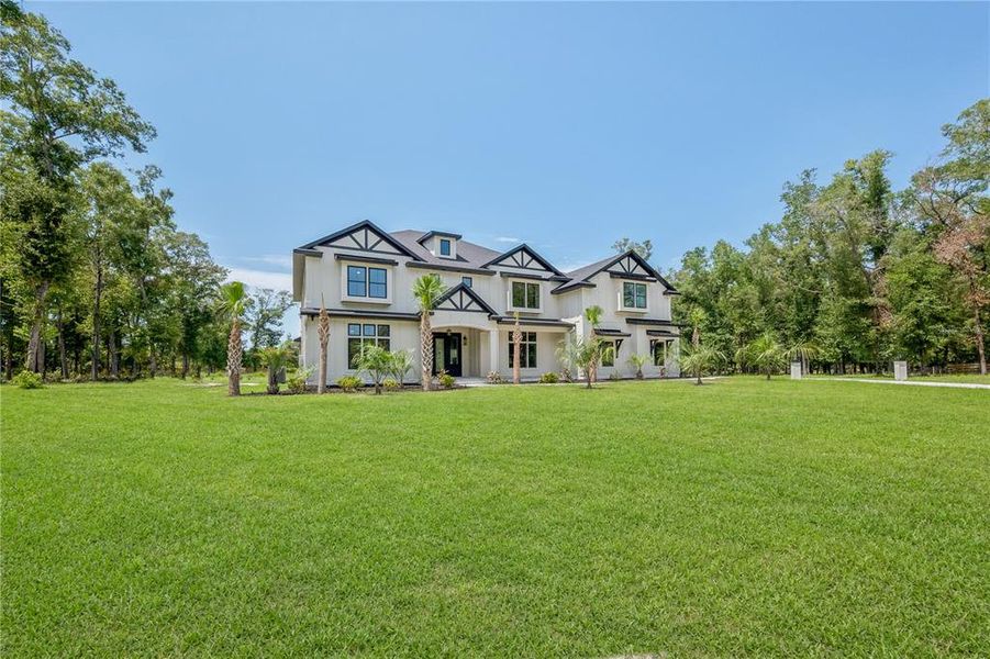 Front exterior of a new home in , High Springs, FL, highlighting curb appeal (Image 22). Front exterior of a new home in , High Springs, FL, highlighting curb appeal (Image 22).