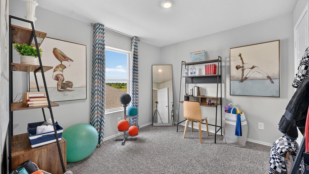 Representative furnished interior of a home built from the Callahan by D.R. Horton in Sunnycreek, Crowley (Image 32).