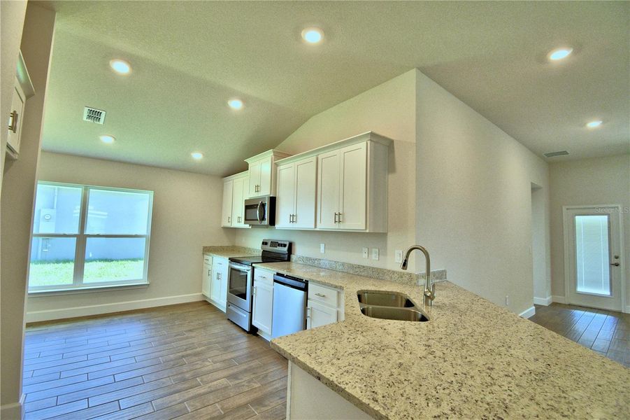 Furnished interior view inside a new home in Lake Juliana Estates, Auburndale (Image 7).
