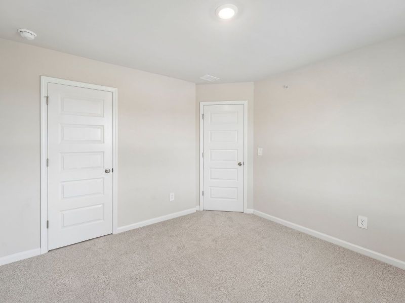 Spacious, unfurnished interior of a new home in Hemingway - Highland Series, Cumming (Image 25).