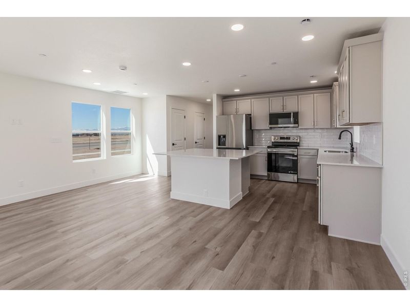 Furnished interior view inside a new home in Prairie Song Story Collection - Single Family Homes, Windsor (Image 10).