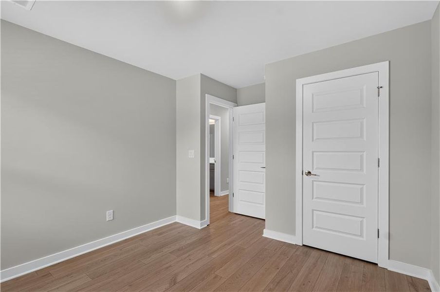 Spacious, unfurnished interior of a new home in The Cottages at East Lanier, Fayetteville (Image 11).