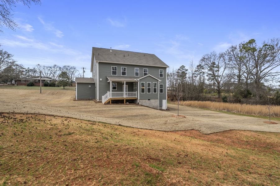 Exterior details and patio area of a home in Ridgecrest at Midway, Anderson (Image 4).