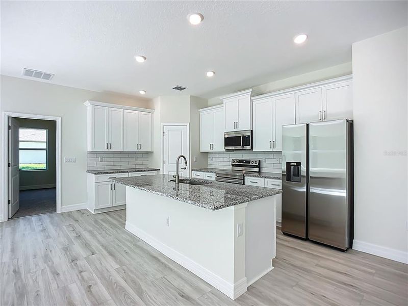 Furnished interior view inside a new home in , North Port (Image 6).