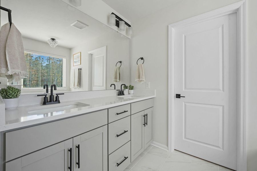 Furnished interior view inside a new home in Jasmine Point at Lakes of Cane Bay, Summerville (Image 42).