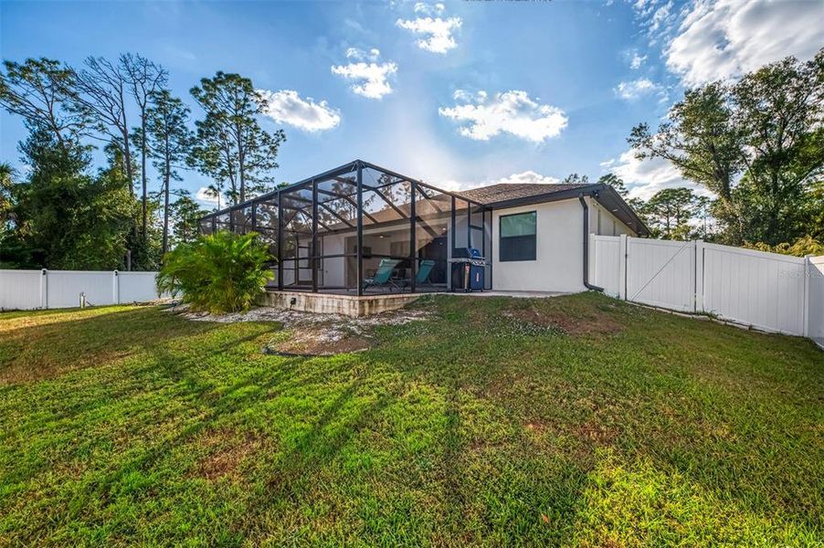 Exterior details and patio area of a home in , North Port (Image 25).