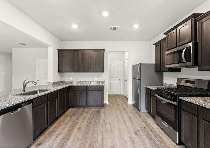 The kitchen of the Rayburn has energy-efficient appliances.