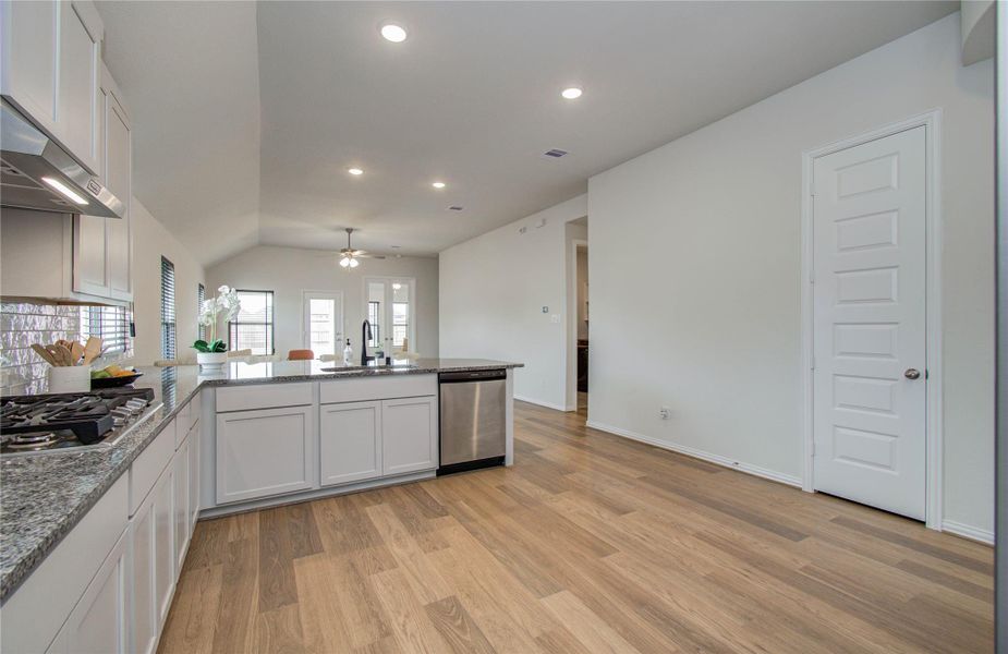 Furnished interior view inside a new home in Sunterra, Katy (Image 8).