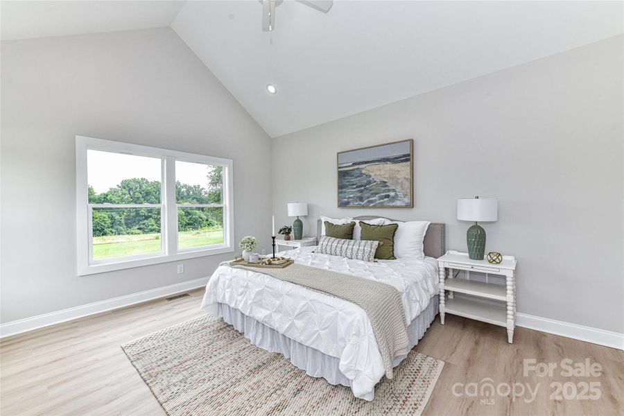 Spacious, Vaulted, Primary Suite on main level with ceiling fan/light, private bath & his & hers walk in closets! Spacious, Vaulted, Primary Suite on main level with ceiling fan/light, private bath & his & hers walk in closets!