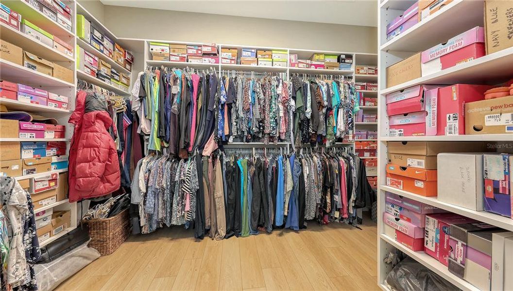 Walk-in Closet with built in shelving